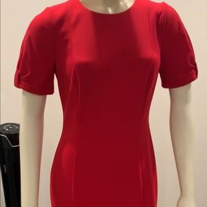 Worn once. Like new. Red fitted cocktail dress. Flattering.